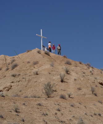 Chimayo pilgrimage hilltop cross — travel photo of Chimayó, Santa Fe & New Mexico