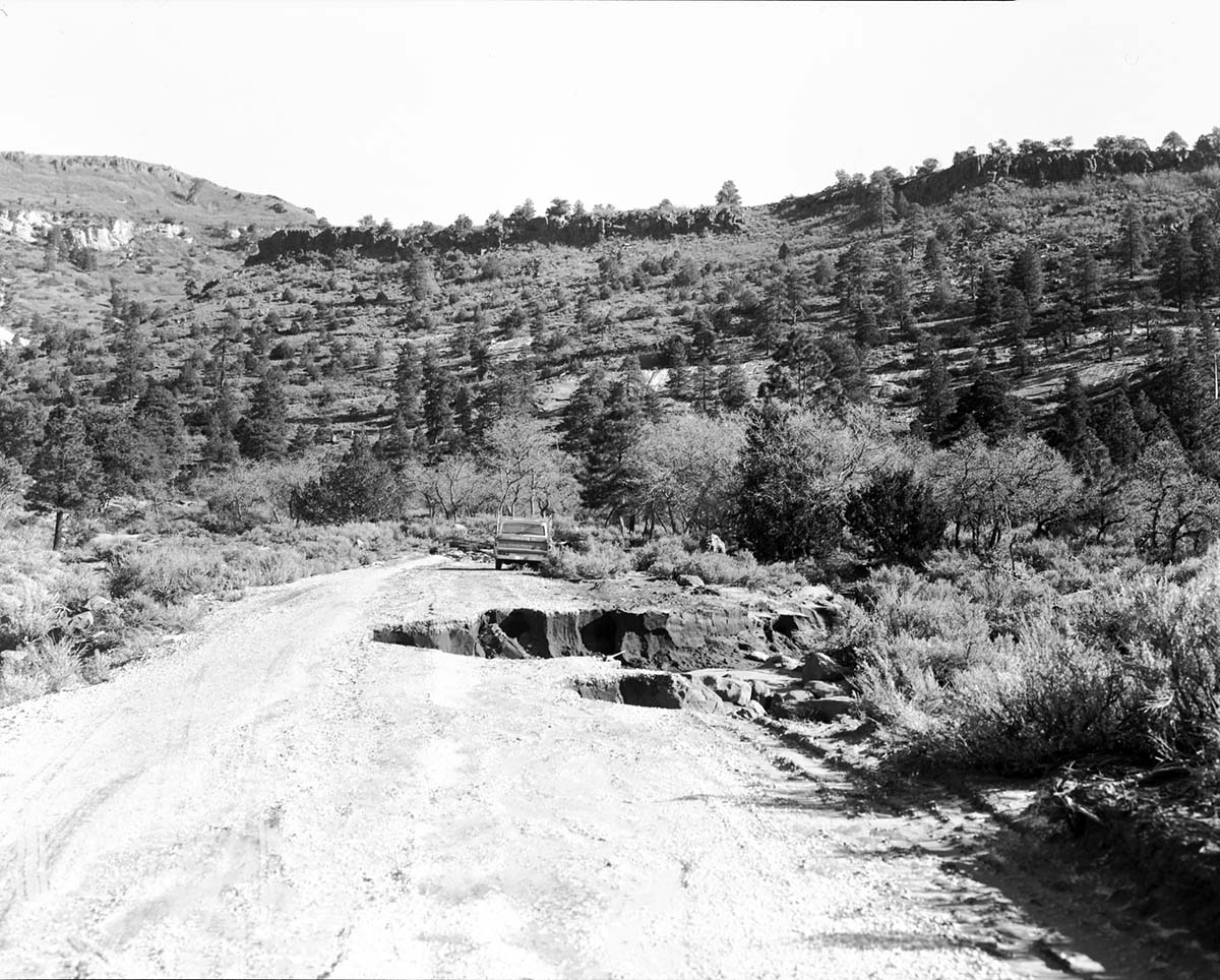 Flood damage - washed out culvert and portion of road near Maloney Hill, Kolob area., ZION Museum and Archives Image ZION (a78de02c596b4ca898445cc402342ad2) — travel photo of Kolob Canyons, Zion & Springdale