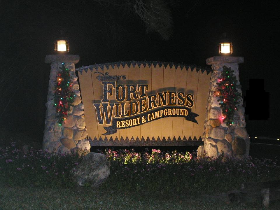 Disney's Fort Wilderness Resort and Campground sign at night — travel photo of Fort Wilderness