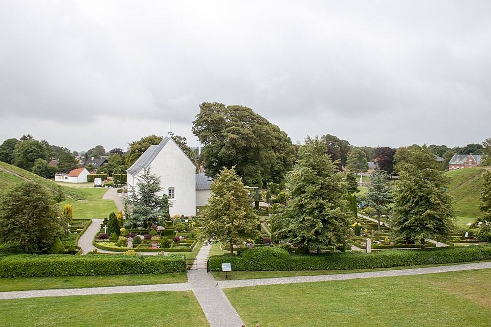 View from the top of the Kongernes Jelling, church and cemetery, July — travel photo of Kongernes Jelling