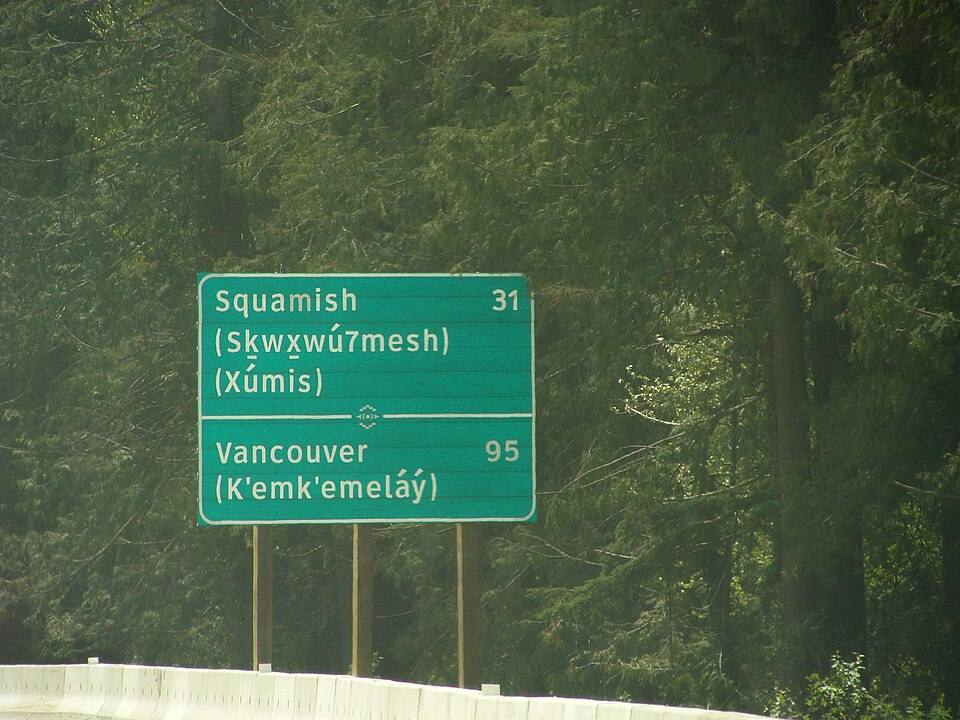 Bilingual road sign in squamish language 1 — travel photo of Squamish, Whistler