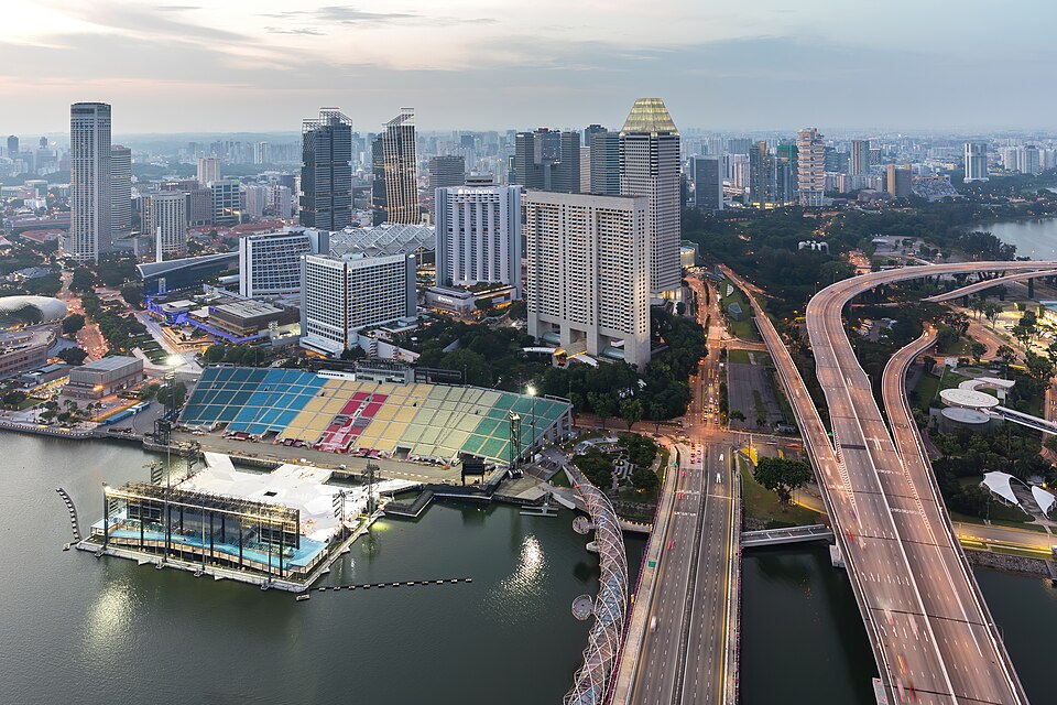 Floating Platform and illuminated East Coast Parkway seen from the sky observation deck of Marina Bay Sands Singapore — travel photo of Marina Bay, Singapore
