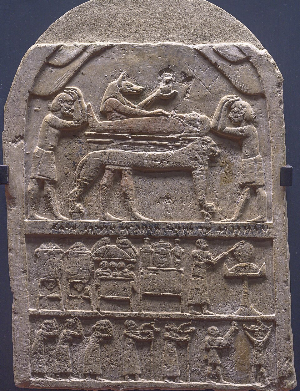 Funerary stele with the mummy on a lion bier, Gregorian Egyptian Museum, Vatican Museums — travel photo of Gregorian Egyptian Museum, Vatican Museums
