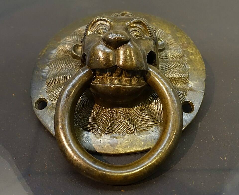 Lion head door puller from the Church of St. Lambertus in Erkelenz, Lower Rhine Valley, bronze - Museum Schnütgen - Cologne, Germany — travel photo of Cologne & the Rhine Valley, Germany