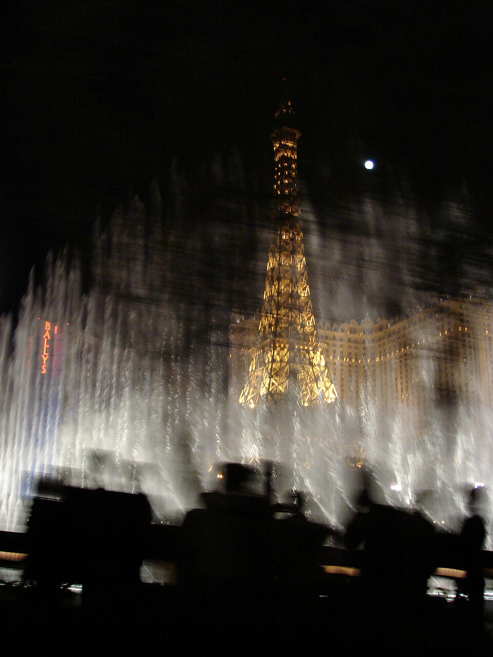 Starr- - -Pinus sp-habitat Bellagio fountains Eiffel Tower and waning moon-The Strip Las Vegas-Nevada ( ) — travel photo of Bellagio & Fountains, The Strip