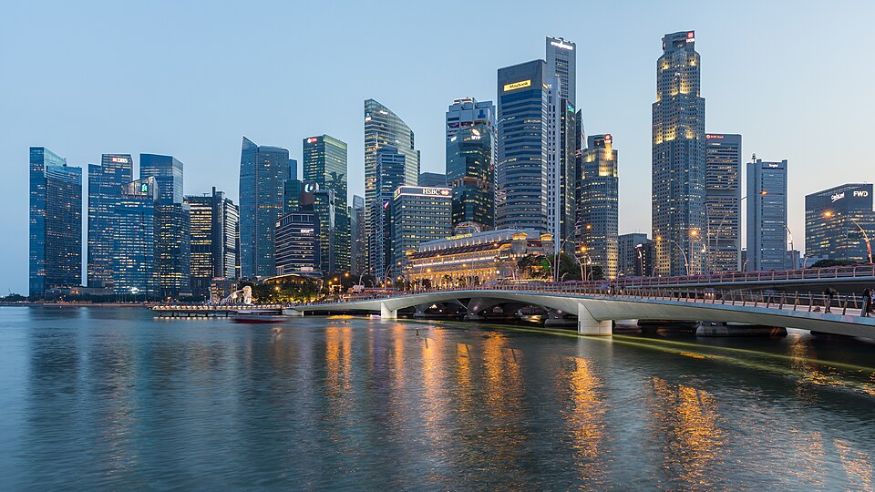 Skyline of the Central Business District of Singapore with Esplanade Bridge in the evening — travel photo of Singapore