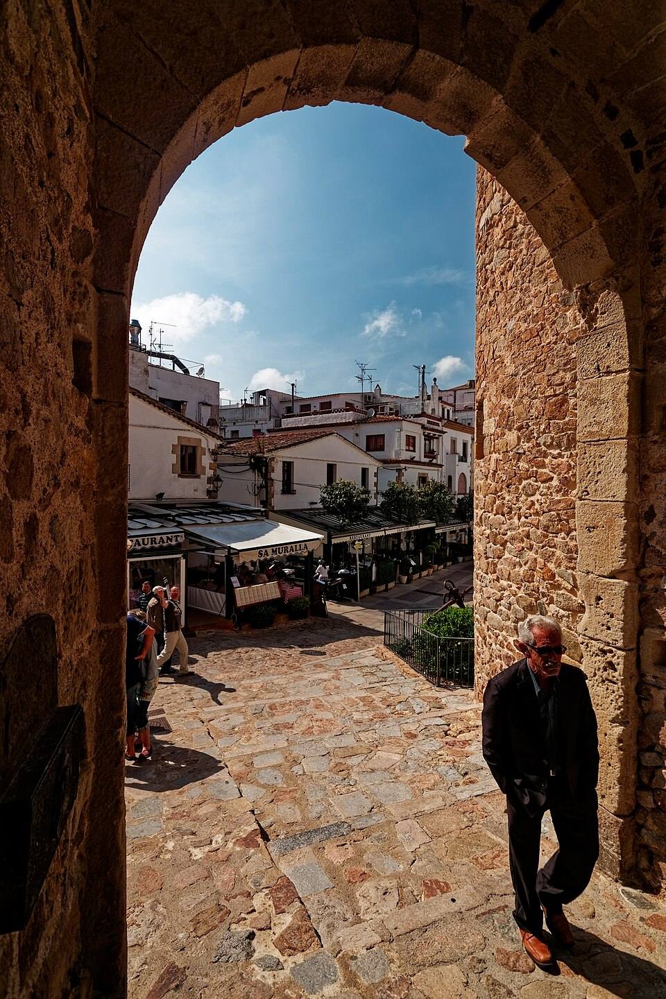 Costa Brava - Tossa de Mar - La Vila Vella - Plaça d' D'armes - View WNW into Carrer del Portal — travel photo of Tossa de Mar