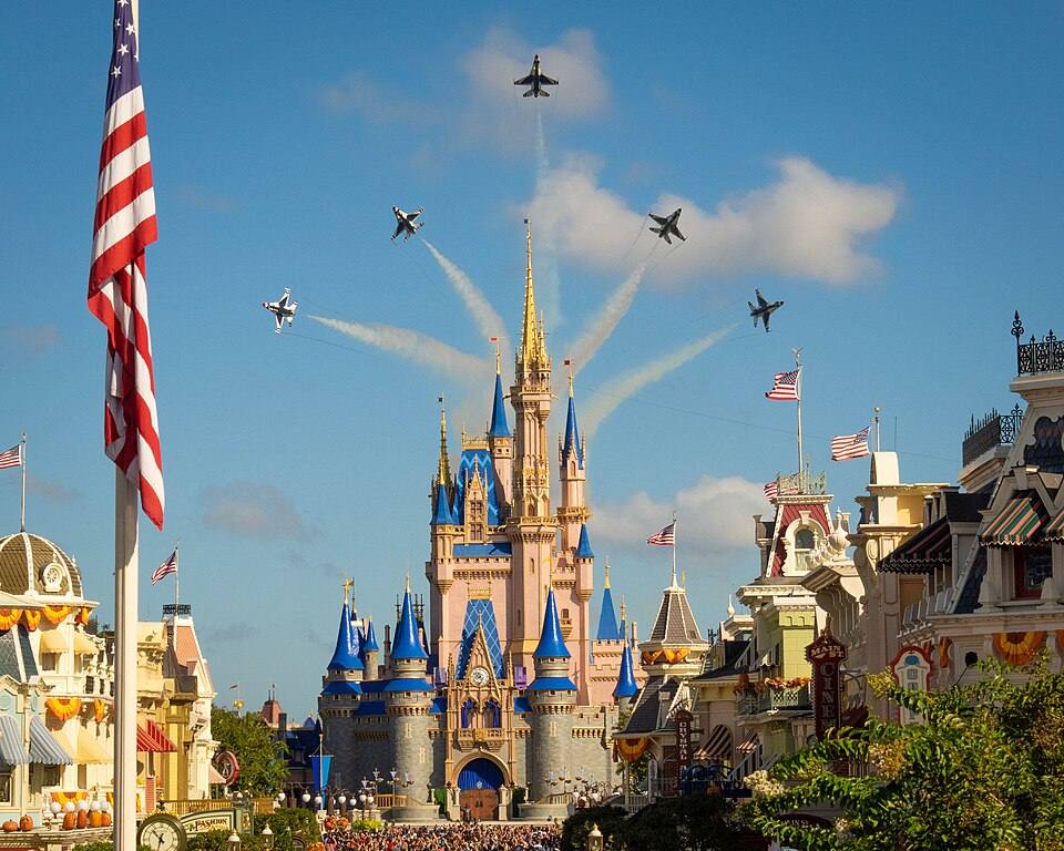 U.S. Air Force Thunderbirds perform a flyover of Cinderella's Castle at Magic Kingdom Park, Walt Disney World Resort, Florida — travel photo of Magic Kingdom Park, Orlando