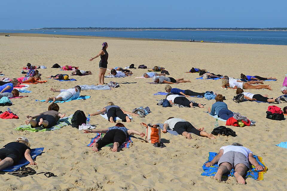 Beach asana class, Plage Pereire, Arcachon — travel photo of Arcachon