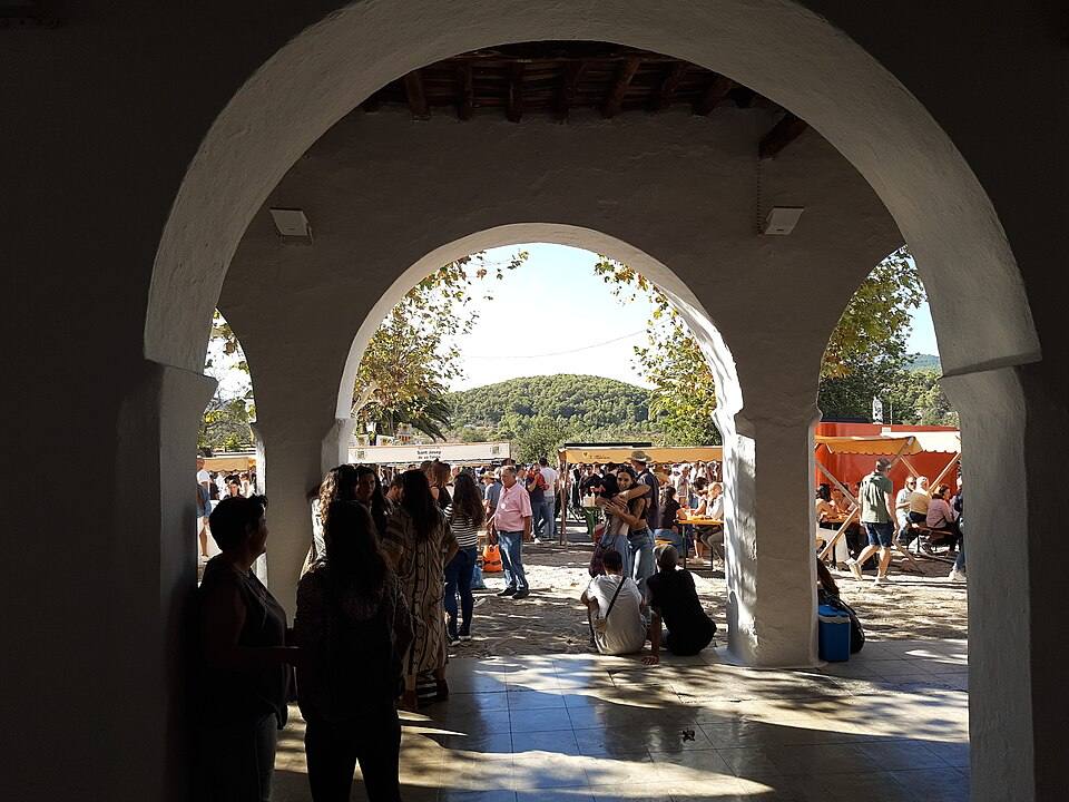 Leaving church to festival, Sant Carles de Peralta, Ibiza — travel photo of Sant Carles de Peralta, Ibiza
