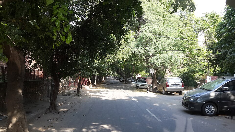 Leafy street in Nizamuddin East — travel photo of Nizamuddin, New Delhi