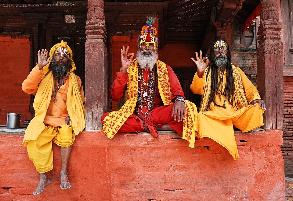 Three saddhus at Kathmandu Durbar Square — travel photo of Kathmandu