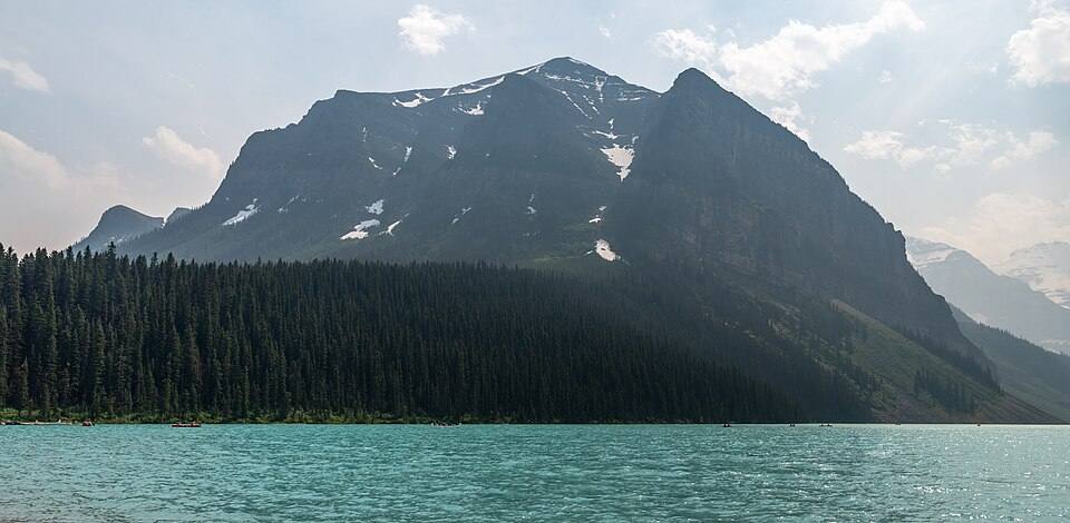 Fairview Mountain across Lake Louise with wildfire smoke haze, Banff National Park, Alberta, Canada — travel photo of Banff & Lake Louise, The Canadian Rockies