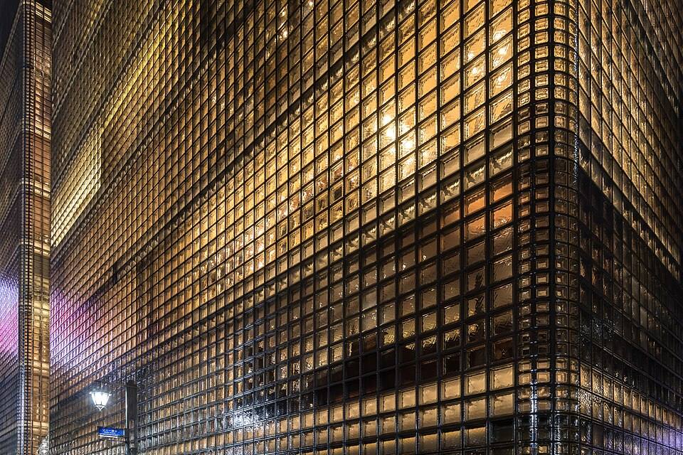 Exterior view of the illuminated facade of Maison Hermès, Ginza, Tokyo, Japan — travel photo of Japan