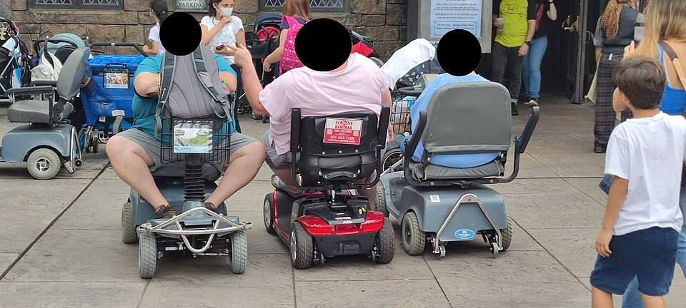 Visitors to Universal Studios Florida transported by electric carts — travel photo of Universal Studios Florida