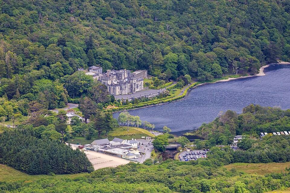 View of Kylemore Abbey and Pollacappall Lough from the slope of Diamond Hill ( ) — travel photo of Kylemore Abbey