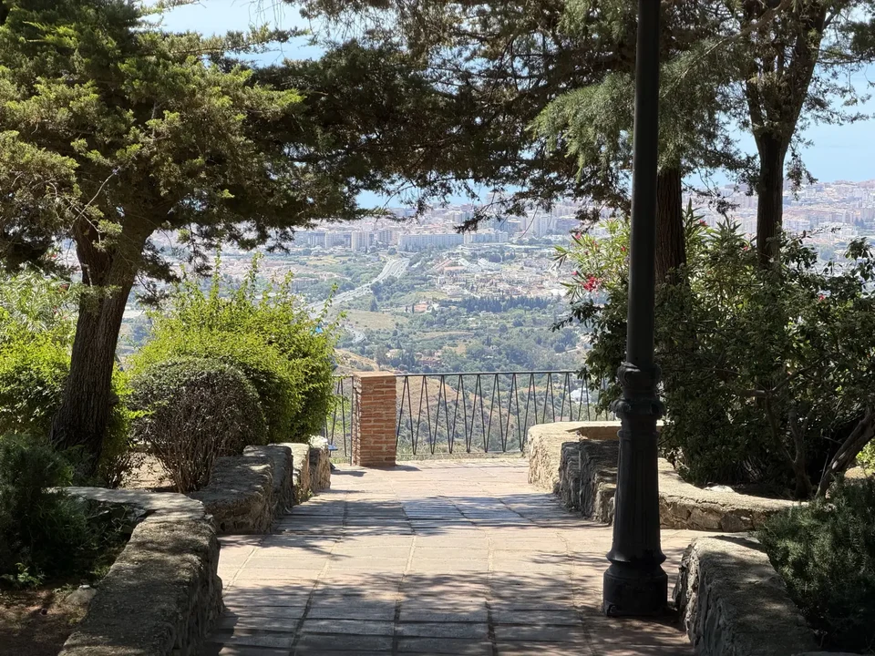 Mijas-muralla-garden-path-coastal-view — travel photo of Mijas